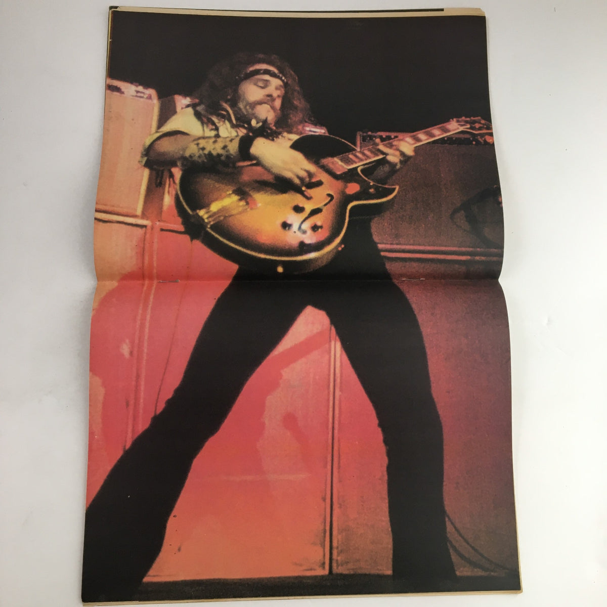 Hit Parader Magazine May 1977 collectible poster of a rock guitarist performing on stage, capturing the vibrant energy of the classic rock era.