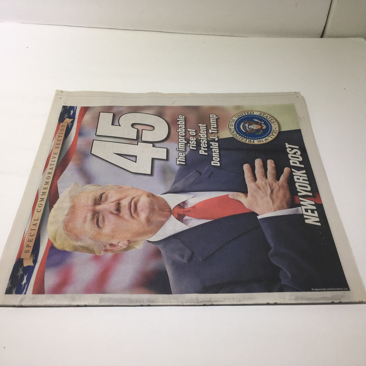 Back cover of NY York Post: January 2017, featuring Donald Trump with the headline 'The Improbable Rise of President Donald J. Trump' and a Presidential Seal design.