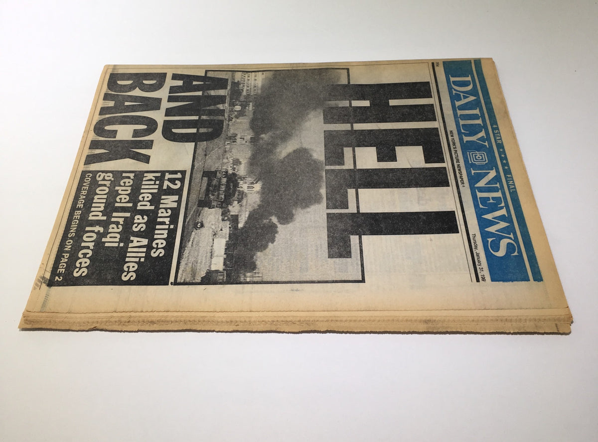 Cover of the NY Daily News from January 30, 1991, titled '12 Marines Killed as Allies Repel Iraqi Ground Forces'. The cover features bold headlines and an impactful photograph depicting smoke and military imagery, capturing a significant moment from the Gulf War era.