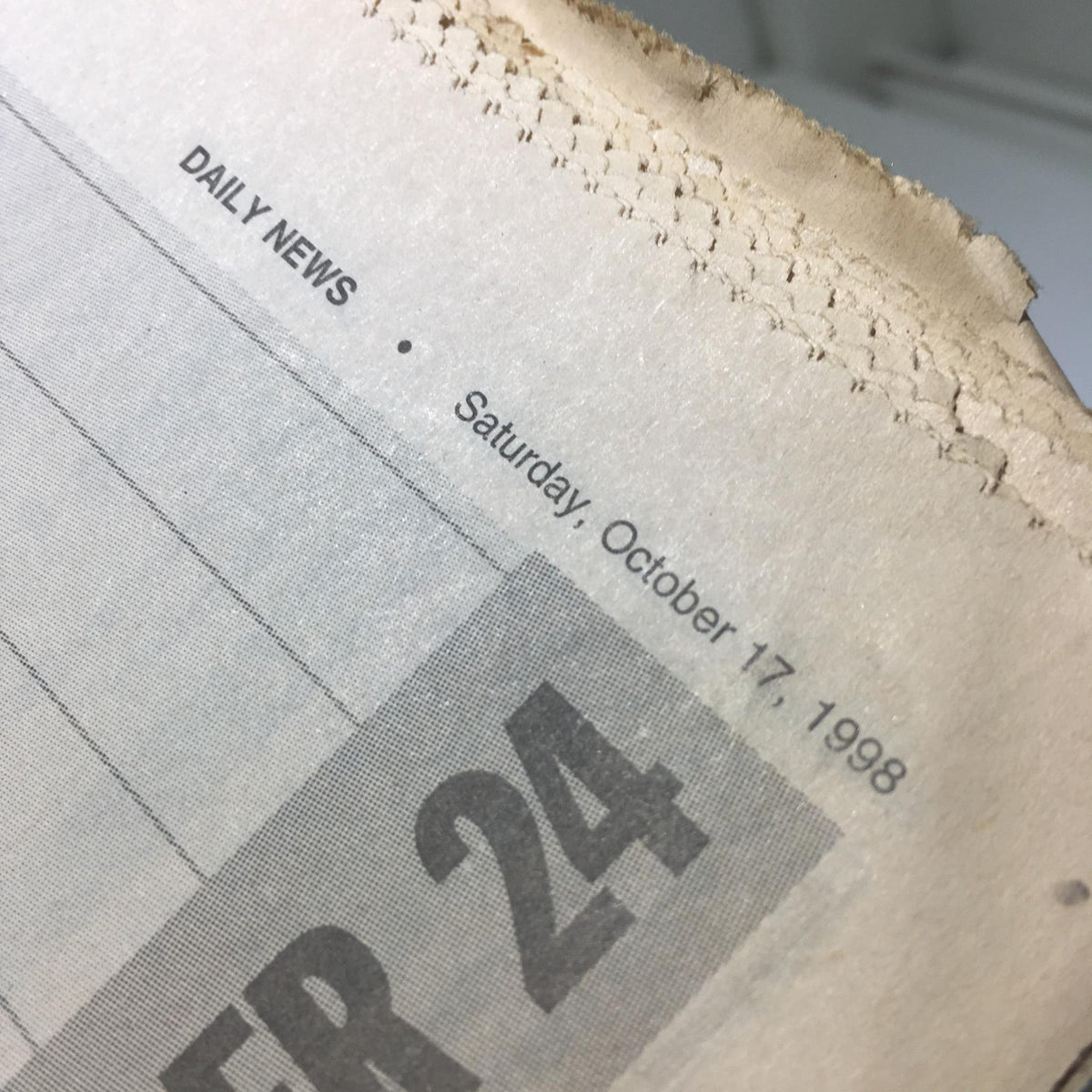 Date header from the New York Daily News showing 'Saturday, October 17, 1998' on the newspaper about the Yankees World Series.