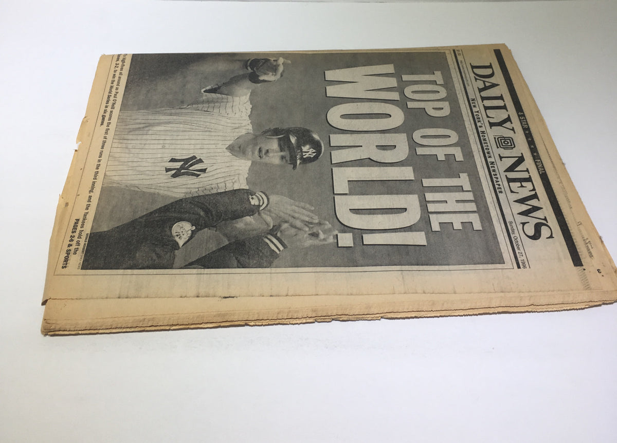 New York Daily News front page featuring Yankees 1996 World Series headline 'Top Of The World', showcasing the excitement of their victory.