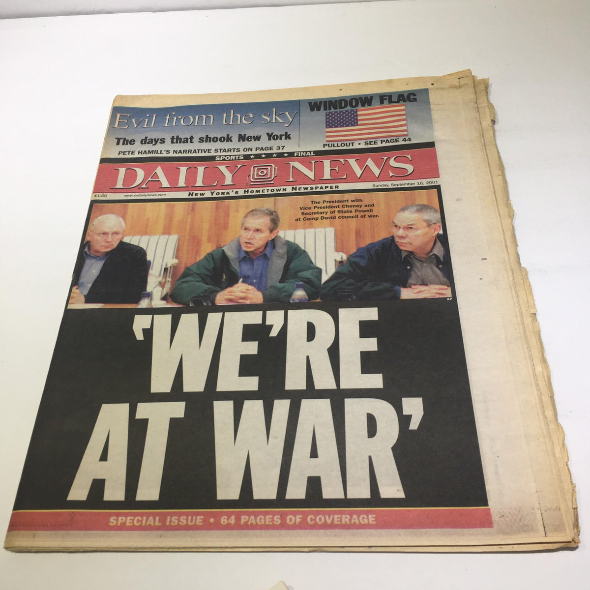New York Daily News front page from September 16, 2001, featuring the headline 'WE'RE AT WAR' with images of prominent figures in discussion.