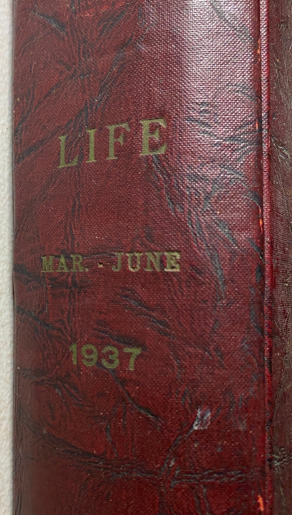 Spine view of the VTG 1937 Bound Life Magazine March - June Weekly Issue, featuring the title 'LIFE' and the months March to June in gold lettering.