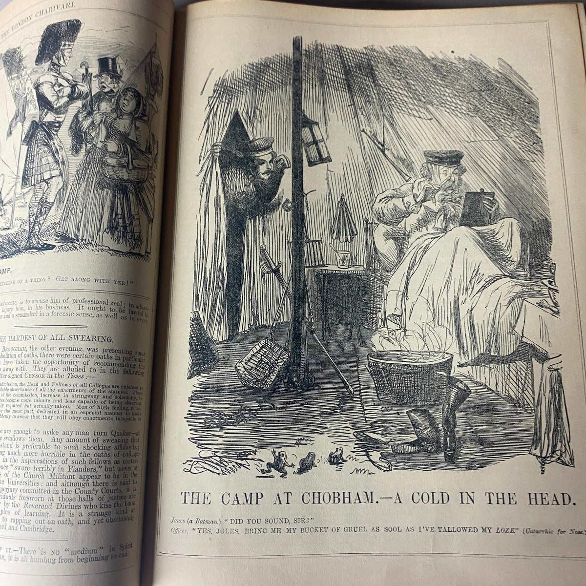 Illustration from VTG 1853 Complete January - December Bound Punch Magazine Volume XXV depicting 'The Camp at Chobham - A Cold in the Head'. The scene shows a character sitting in a tent environment with humorous commentary.