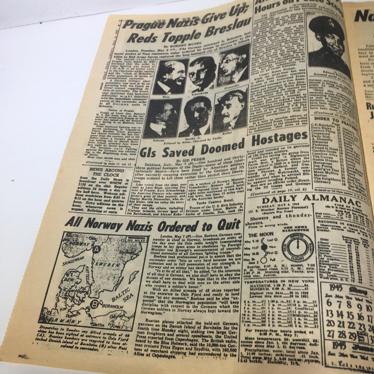 Another inside page of the New York Daily News from May 8, 1945, highlighting news on the surrender of Nazis in Prague and orders for Norwegian Nazis to quit, under the historic proclamation.