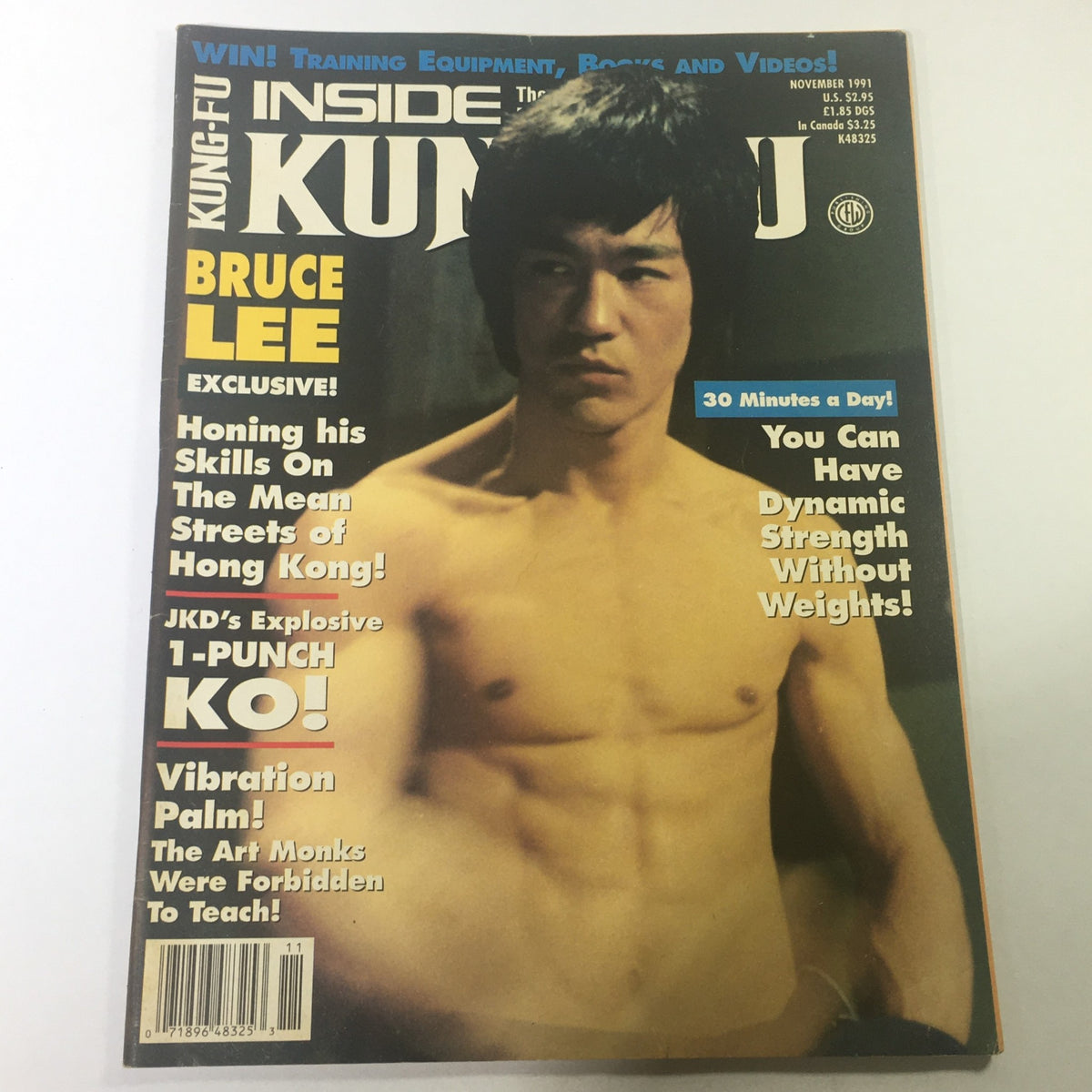 Cover of Inside Kung Fu Magazine from November 1991 featuring Bruce Lee. Highlights include articles on honing skills in Hong Kong and dynamic strength training. Celebrating martial arts history and Bruce Lee's legacy in the realm of Jeet Kune Do.