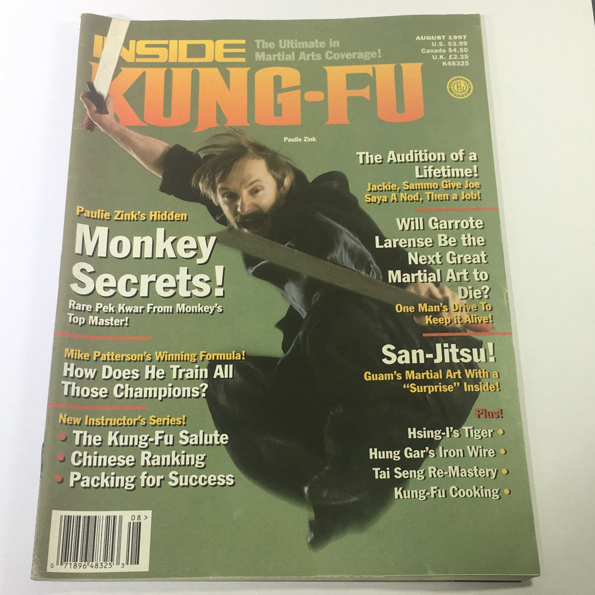 Cover of Inside Kung Fu Magazine August 1997 featuring Paulie Zink with a sword, highlighting articles on Monkey secrets and Garrote Larense martial arts.