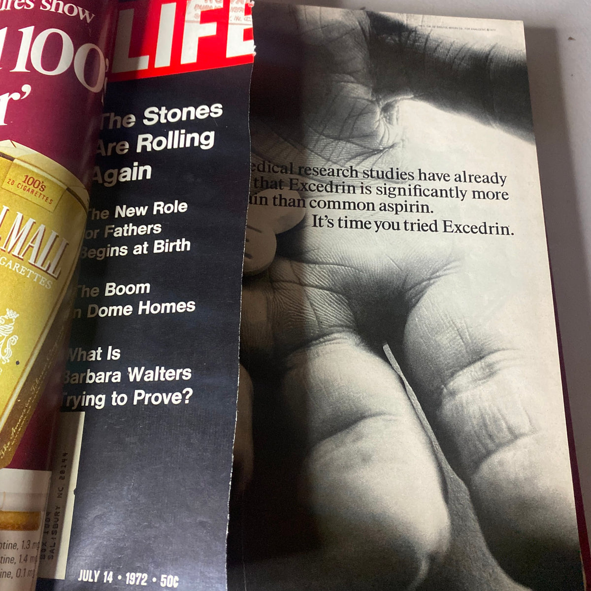 Inside the VTG 1972 Bound Life Magazine, showing a partially torn page from the July 14 issue with articles on The Rolling Stones.