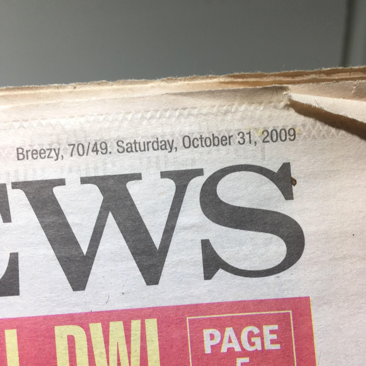 Close-up of the date on New York Daily News, indicating Saturday, October 31, 2009.