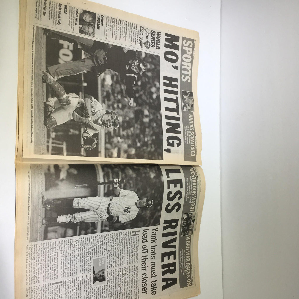 New York Daily News from Oct 31 2009 displaying a World Series edition, discussing Yankees hitting strategy with headlines like 'MO HITTING, LESS RIVERA'.