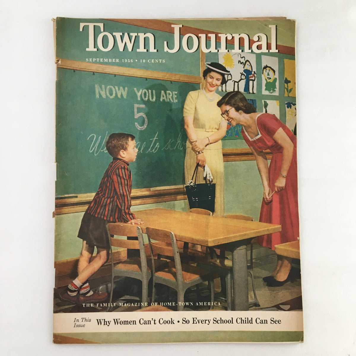 Cover of Town Journal Magazine September 1956 featuring a child and two women in a classroom setting, showcasing traditional family values and education.