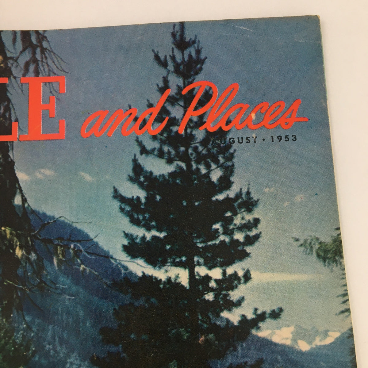 Cover of People and Places Magazine August 1953 featuring scenic trees and mountains, highlighting foldboating in Washington.