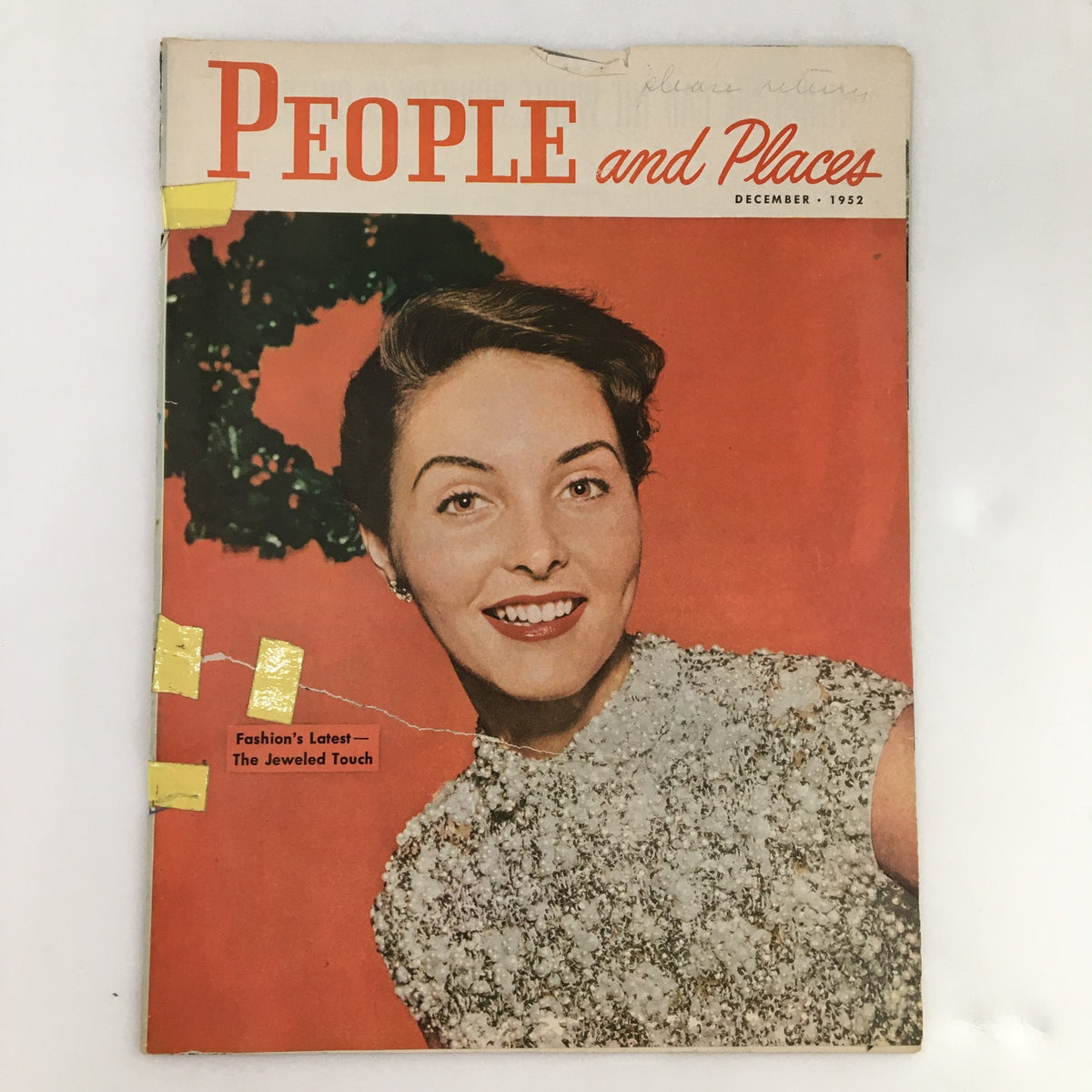 Cover of People and Places Magazine December 1952 featuring the title 'Fashion's Latest: The Jeweled Touch', showcasing a woman in a glamorous outfit and jewelry, embodying the elegance of 1950s fashion.