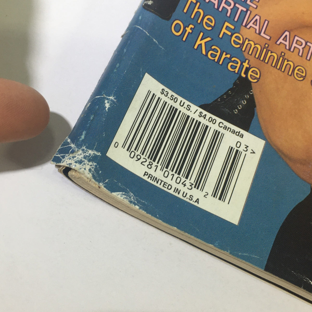 Close-up of the spine of Black Belt Magazine March 1996, displaying the barcode and magazine details.