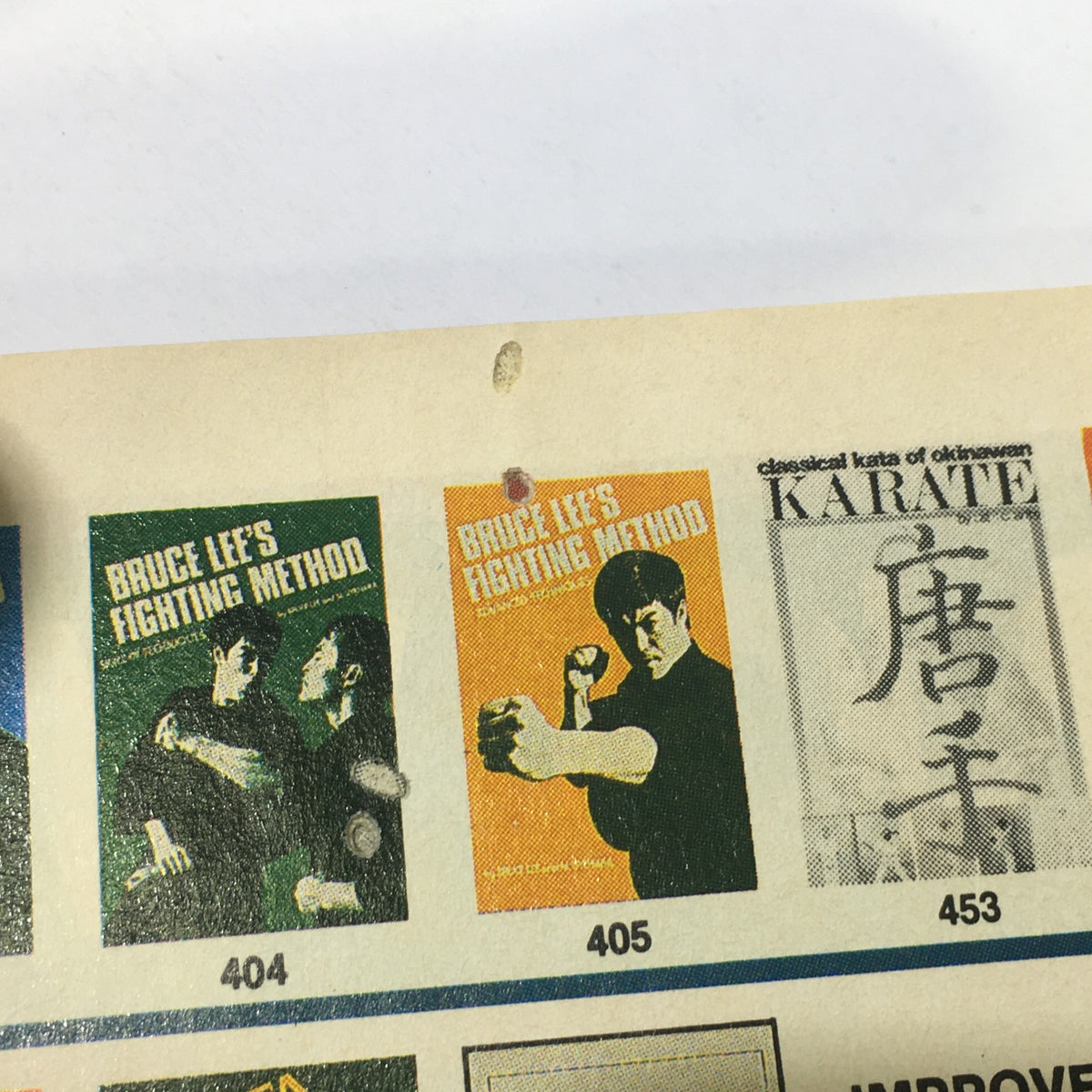 Interior page of VTG Black Belt Magazine May 1988 displaying ads for Bruce Lee's Fighting Method books, emphasizing martial arts literature.