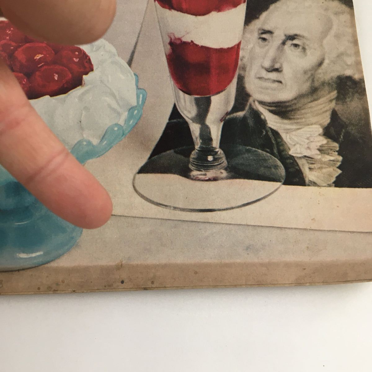 Detail view of the Family Circle Magazine February 1955 cover displaying desserts and a historic figure in the background.