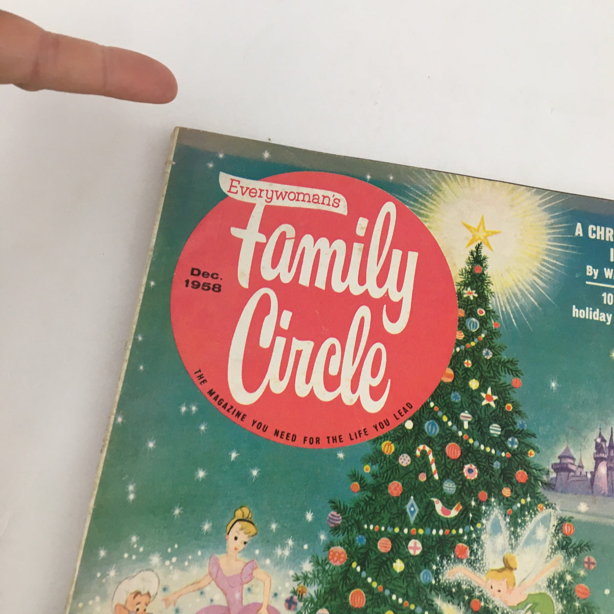 Close-up of the Family Circle Magazine December 1958 title, highlighting its festive design and vintage style related to Disneyland's Christmas adventure.