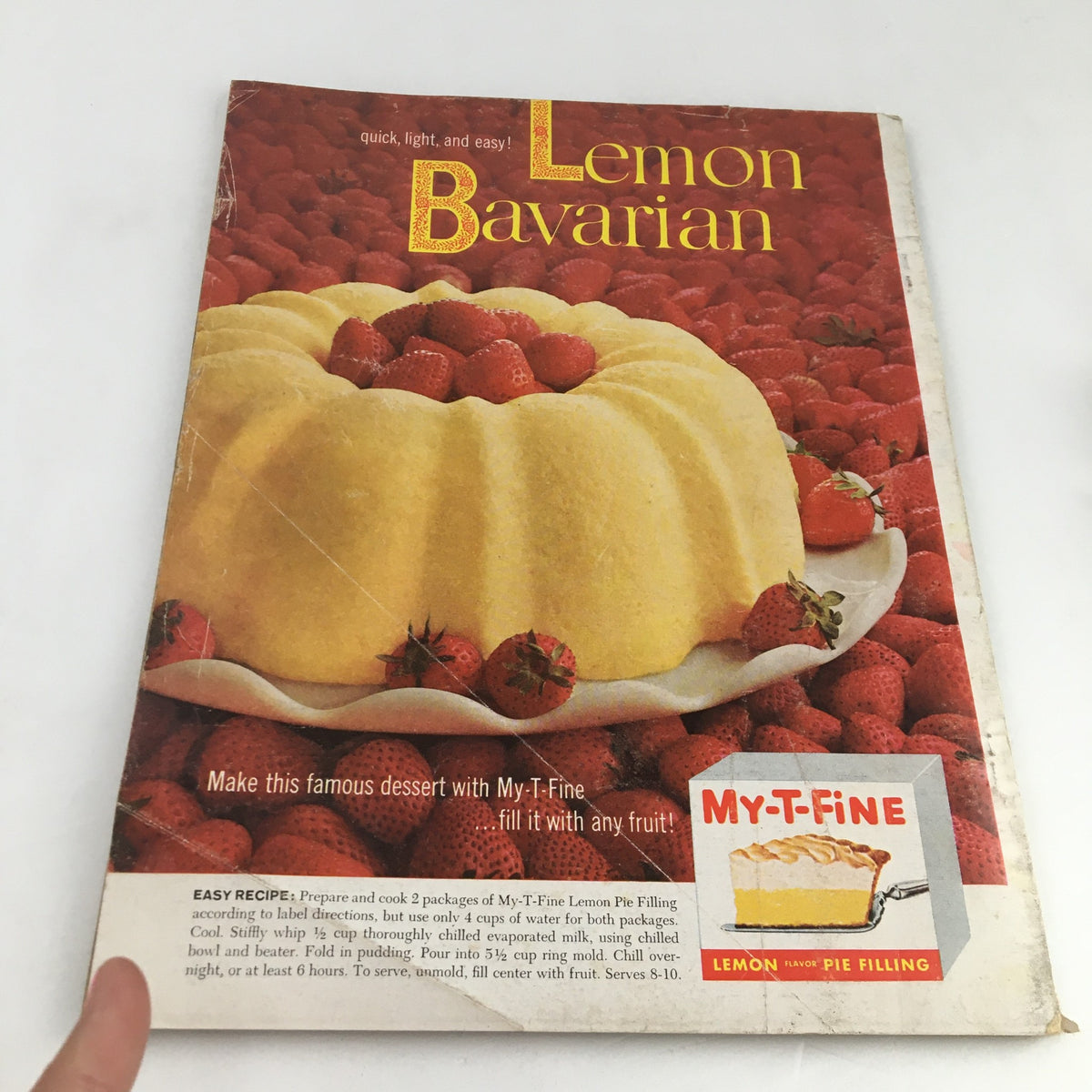 Family Circle Magazine March 1962 featuring a Lemon Bavarian dessert on the cover with strawberries, showcasing traditional recipes and decorating ideas.