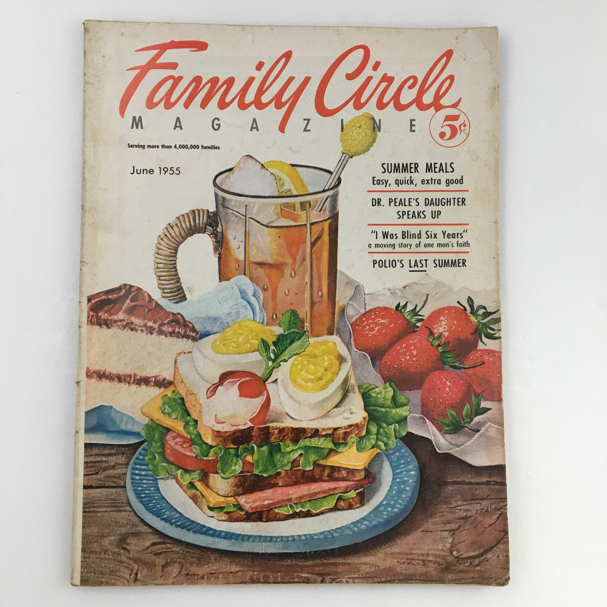 Cover of Family Circle Magazine from June 1955 featuring vibrant illustrations of a summer meal including sandwiches, strawberries, and a refreshing drink. Notable headline: 'Dr. Peale's Daughter Speaks Up.' Perfect for vintage magazine collectors.