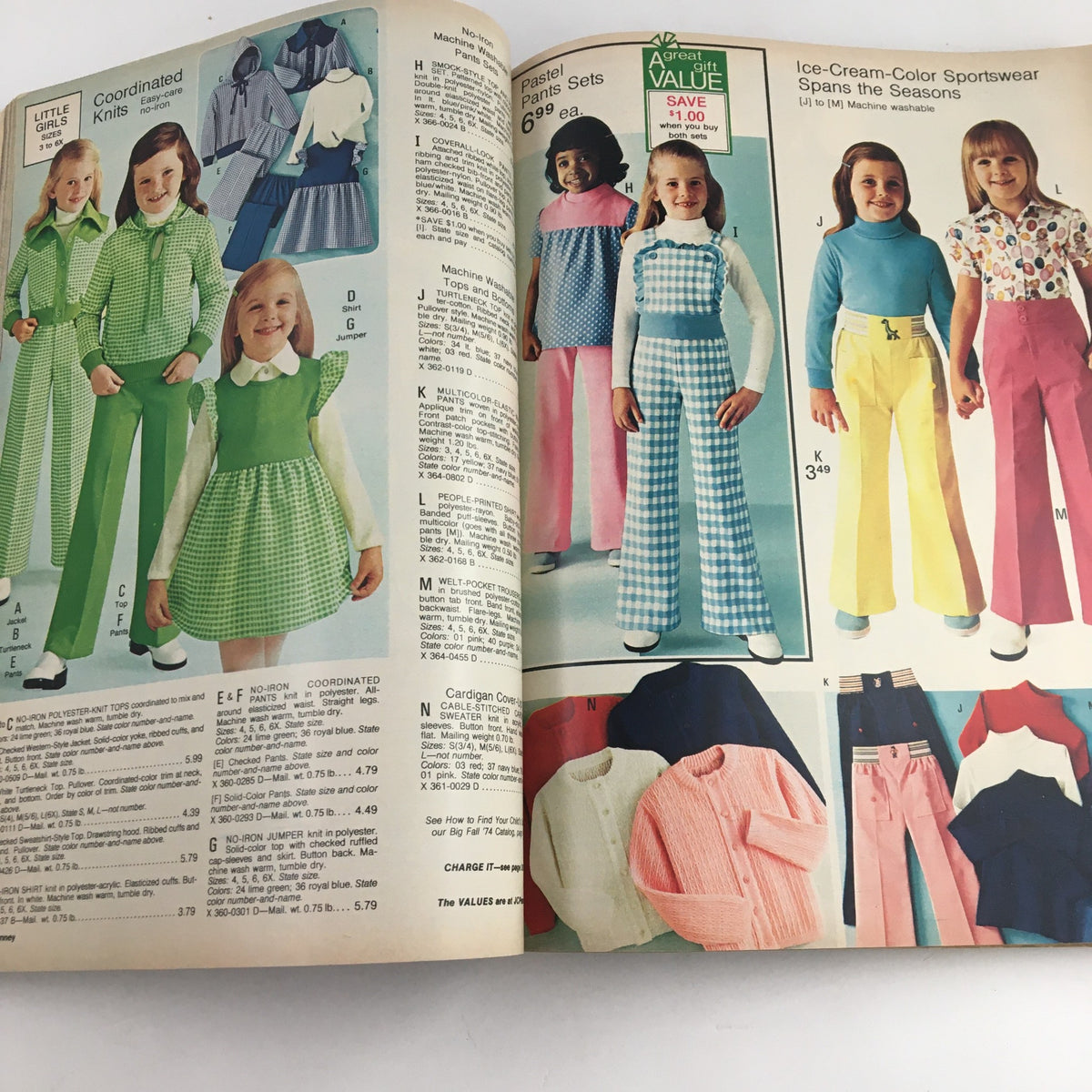 Inside spread of the 1974 JCPenney Christmas Colorful Weebles Toys and Dresses Price Catalog showcasing children's coordinated outfits and styles for the holiday season.