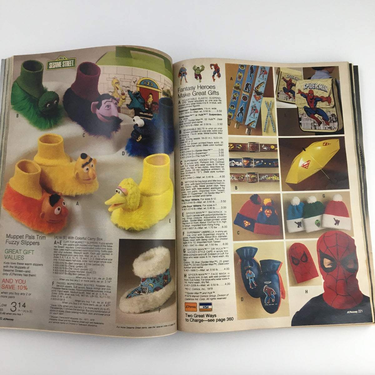 Inside page of the 1979 JCPenney Christmas Toys Prices Catalog displaying colorful plush slippers and gifts from Sesame Street characters.