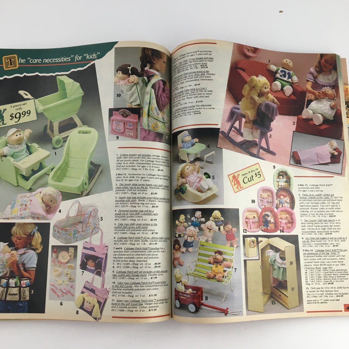 1985 Sears Wish Book Care Bear Cousins Price Guide Catalog highlighting 'Care Necessities' for kids, featuring a green baby stroller set and various Cabbage Patch Kids accessories, with prices listed.