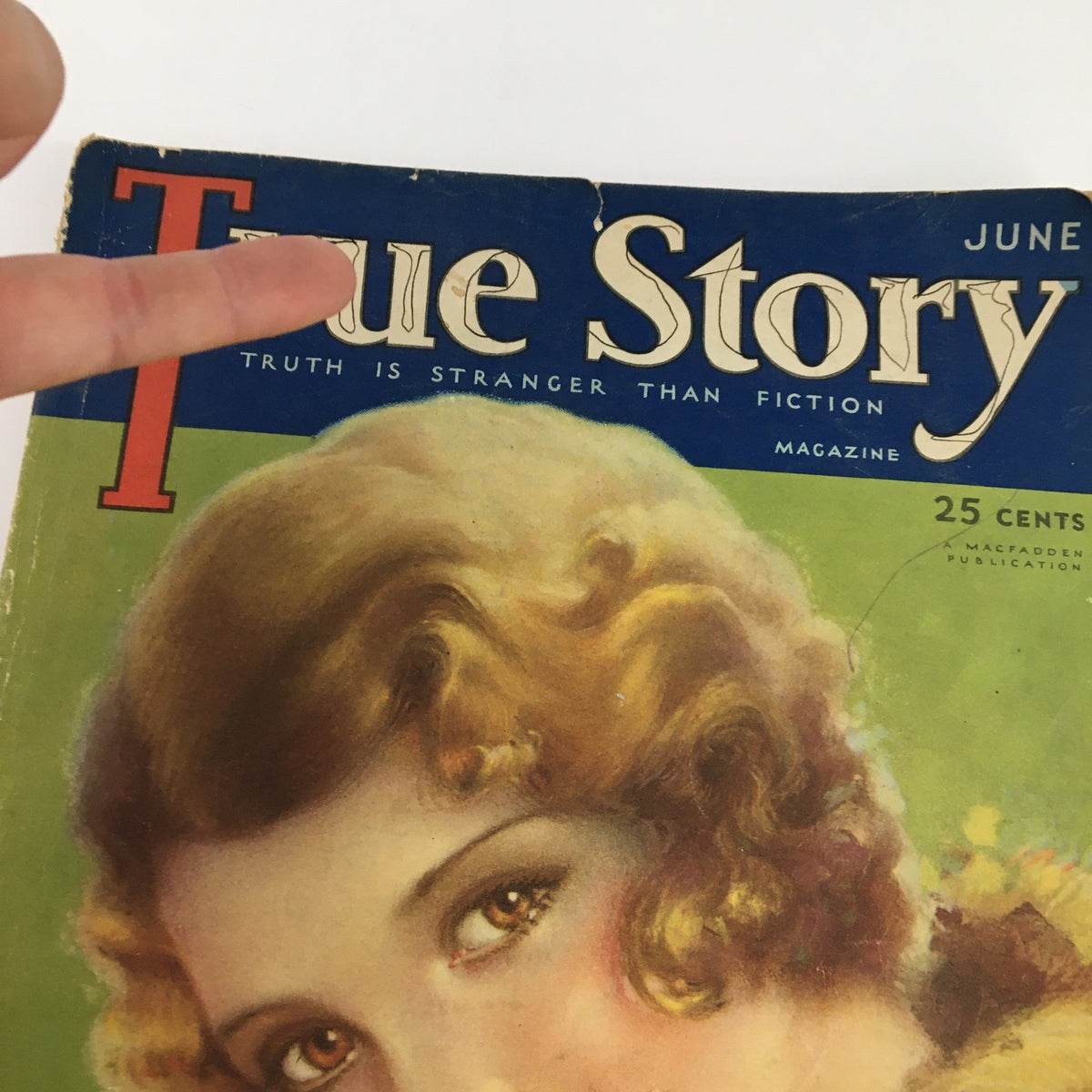 Close-up detail of the True Story Magazine cover from June 1932, highlighting the magazine's title and the woman's captivating expression.