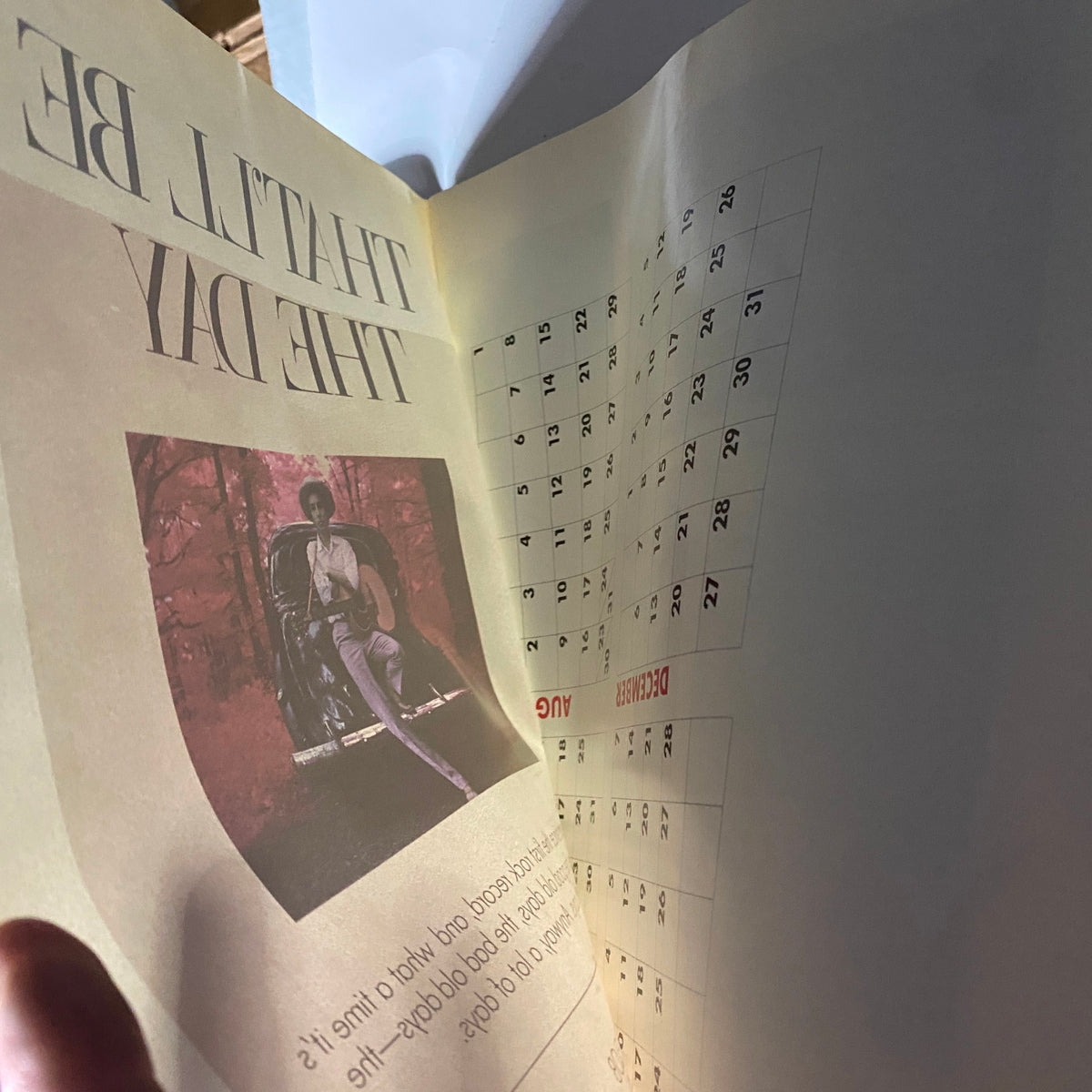 Inside page of VTG Spin Magazine January 1987 Vol 2 No. 10 Janet Jackson featuring a calendar for December, showcasing a vintage photograph of a musician.