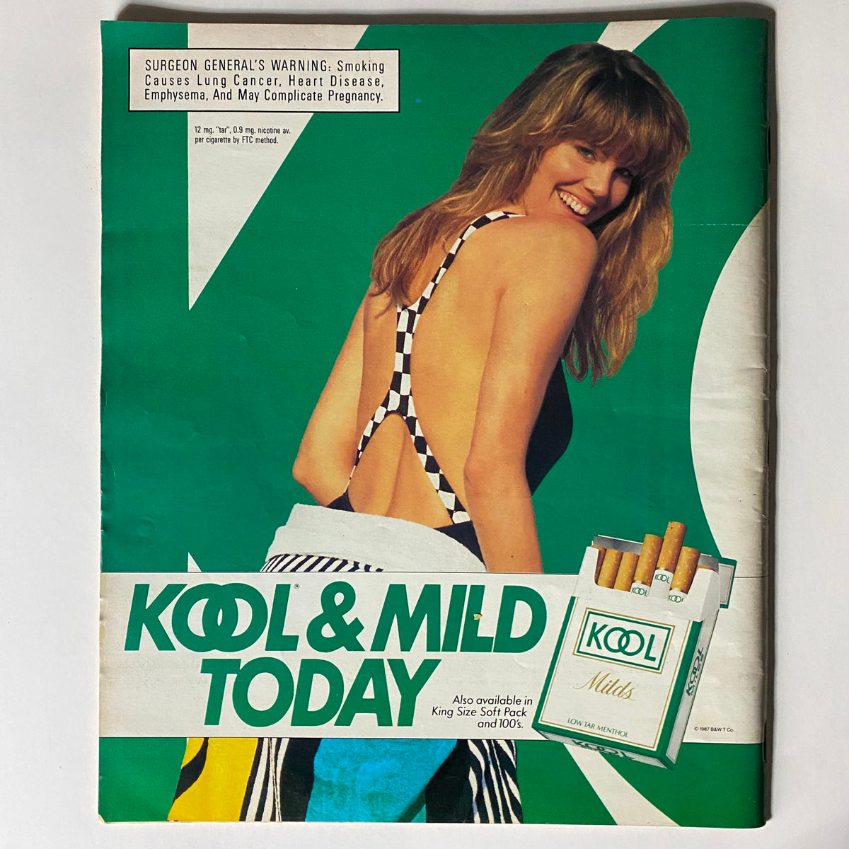 Advertisement page from Spin Magazine November 1987 displaying Kool & Mild cigarettes with a vibrant design.