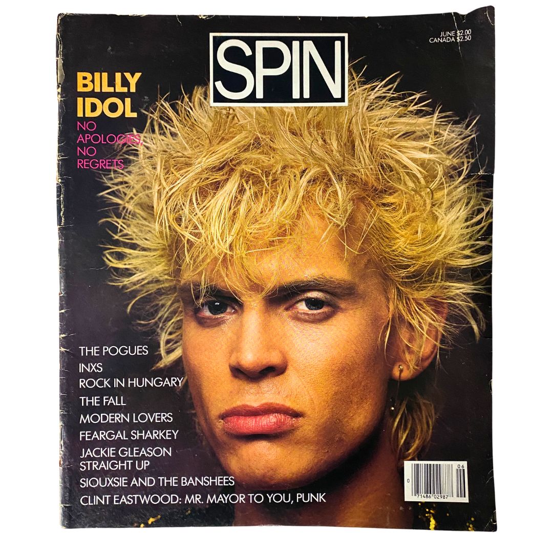 Cover of VTG Spin Magazine June 1986 Vol 2 No. 3 featuring Billy Idol, showcasing the vibrant punk culture with bold colors and hair styling that reflects the era. The issue also includes features on The Pogues and other influential artists of the time.