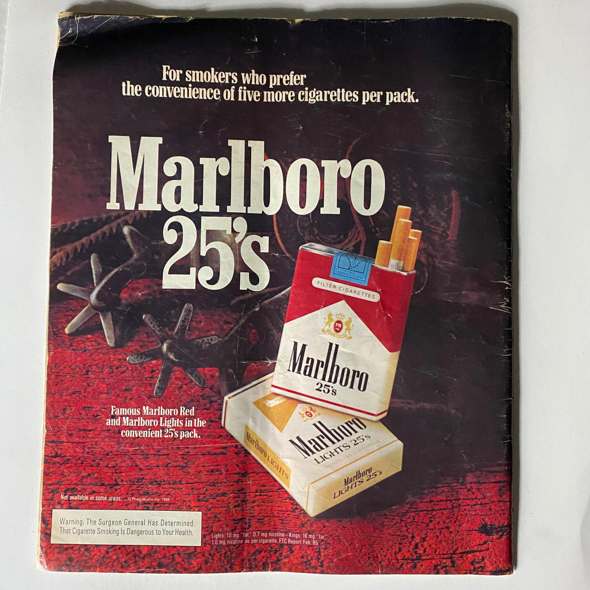 Back cover of VTG Spin Magazine September 1985 Vol 1 No. 5 featuring an advertisement for Marlboro 25's cigarettes, reflecting the advertising style of the era.