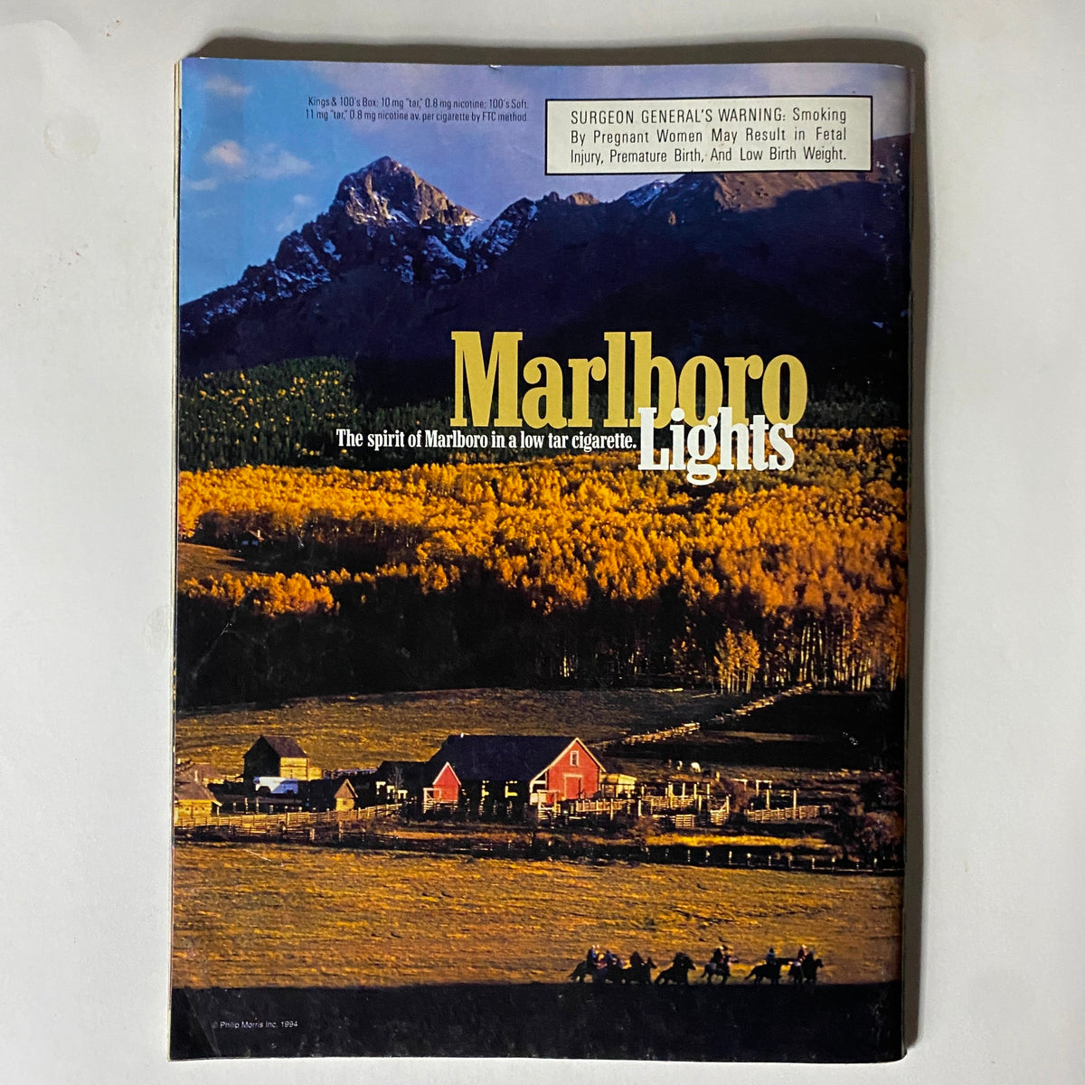 Back cover of the Entertainment Magazine September 30 1994 featuring a Marlboro Lights advertisement with a scenic landscape, adding contrast to the festival-themed content of the magazine.