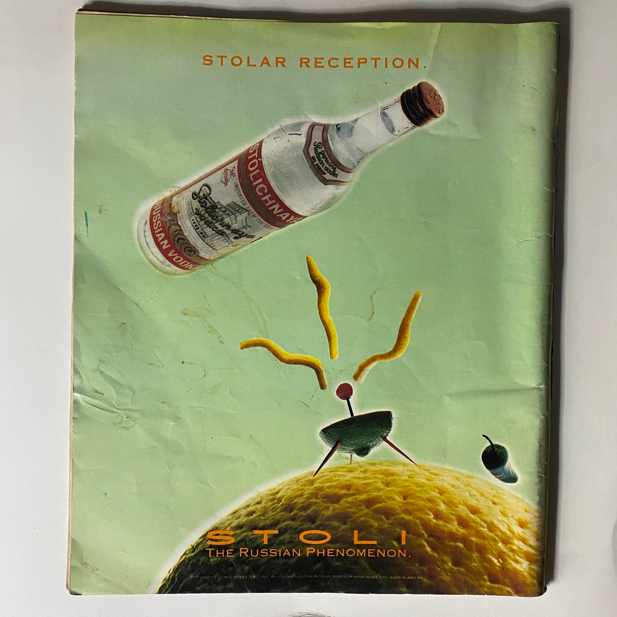 Back cover of Creem Magazine June July 1992 Vol 1 #7, featuring an artistic advertisement for Stoli vodka, highlighting a creative and vibrant design.