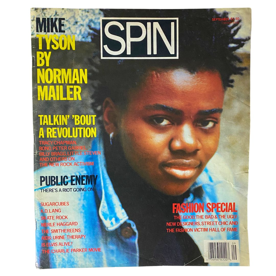 Cover of Spin Magazine September 1988, Vol 4 No. 6 featuring Mike Tyson and Tracy Chapman, showcasing vibrant 1980s culture.