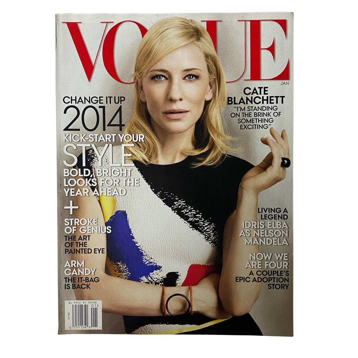Vogue Magazine January 2014 issue featuring Cate Blanchett on the cover, highlighting her style in a colorful dress, and promoting the theme for 2014.