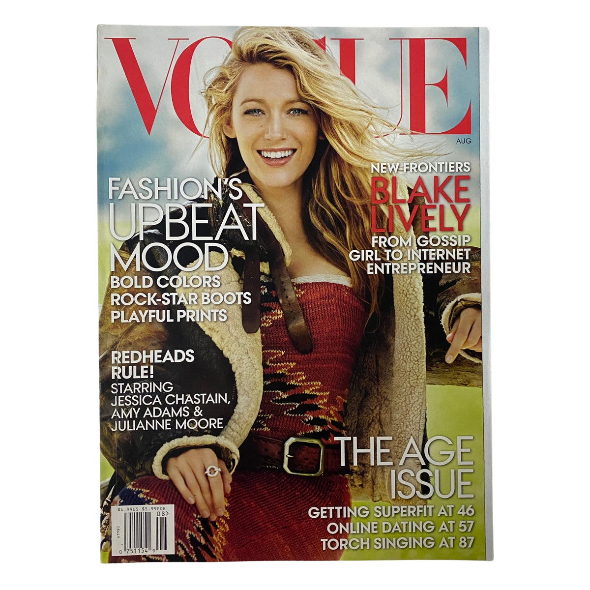 Vogue Magazine August 2014 featuring Blake Lively on the cover, showcasing a fashion-forward editorial theme with highlights on bold colors and trends.