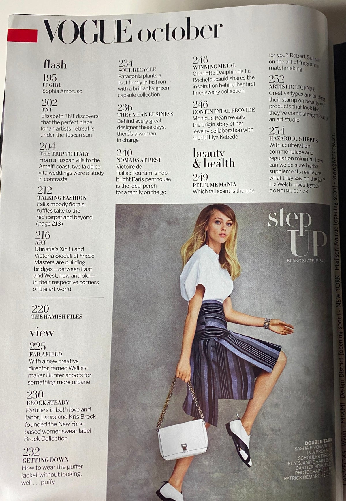 Vogue Magazine October 2014 contents page listing features like 'Flash' and 'Beauty & Health' alongside 'Step Up' style guide.