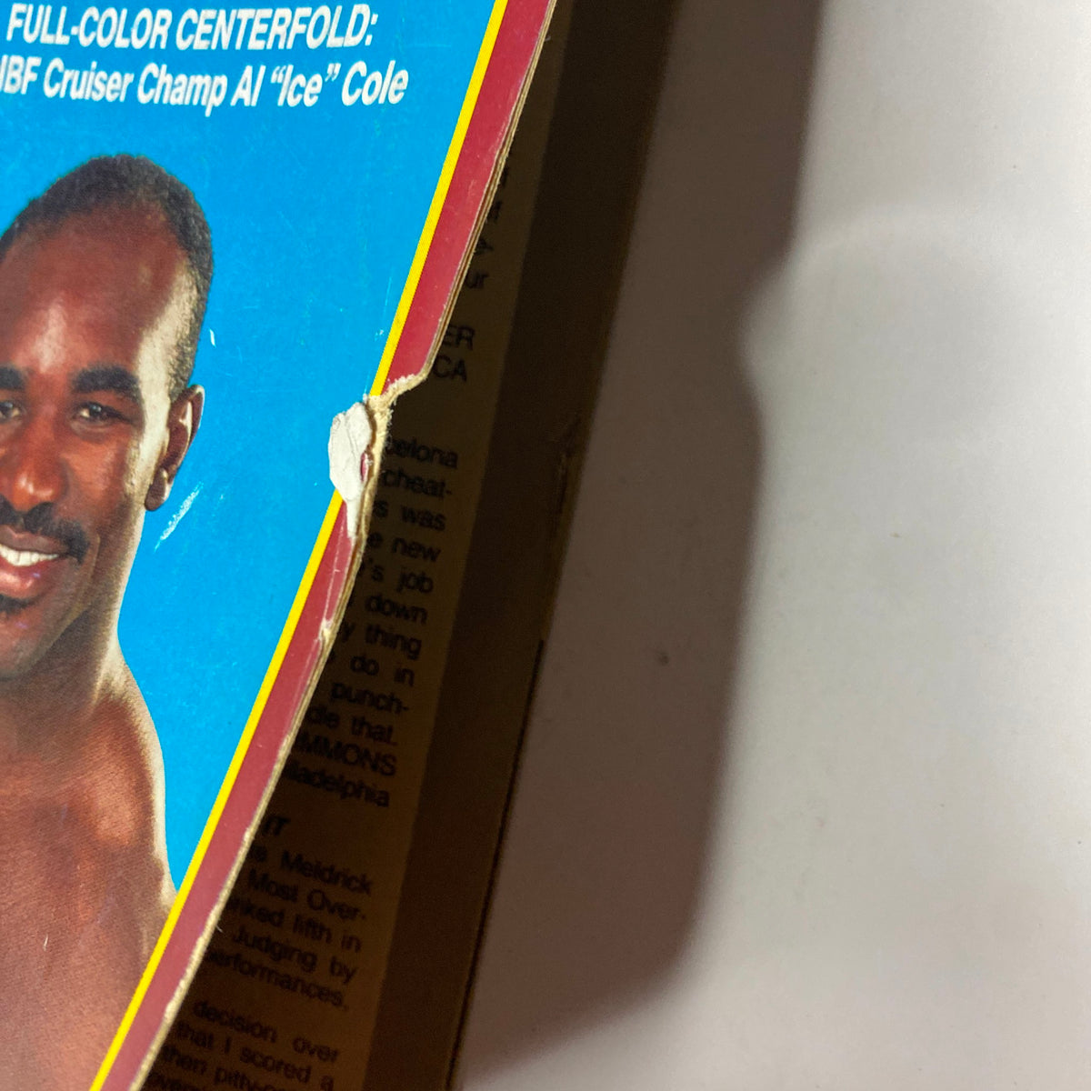 Close-up image of the side of the KO Boxing Magazine January 1993 showing the spine detail and part of the cover featuring Evander Holyfield.
