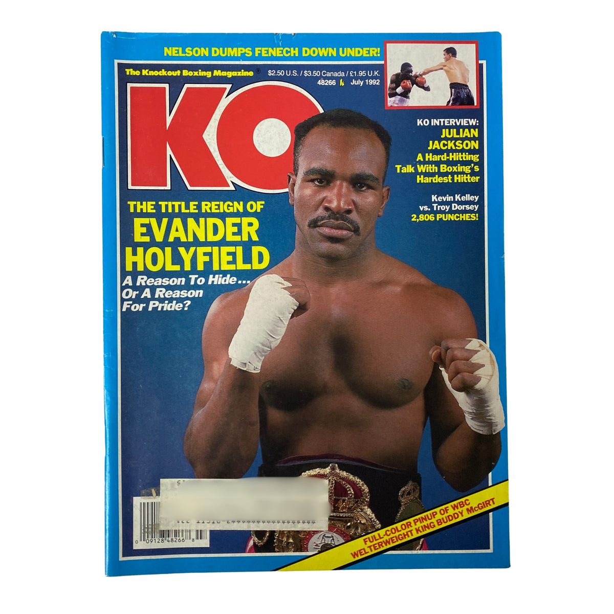 KO Boxing Magazine July 1992 Evander Holyfield Cover showcasing Evander Holyfield posing in boxing attire, highlighting his title reign with a bold headline. The magazine cover features vibrant colors and captures the essence of boxing culture from the early 1990s.