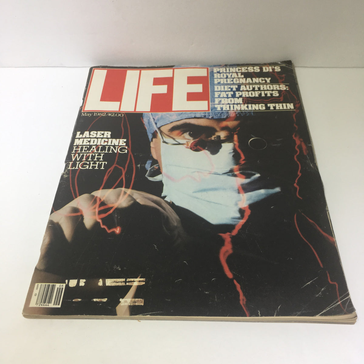 Cover of Life Magazine from May 1982 featuring the title 'Laser Medicine - Princess Di's Royal Pregnancy'. The cover includes an image of a surgeon with a surgical mask and glasses, symbolizing advancements in medical technology.
