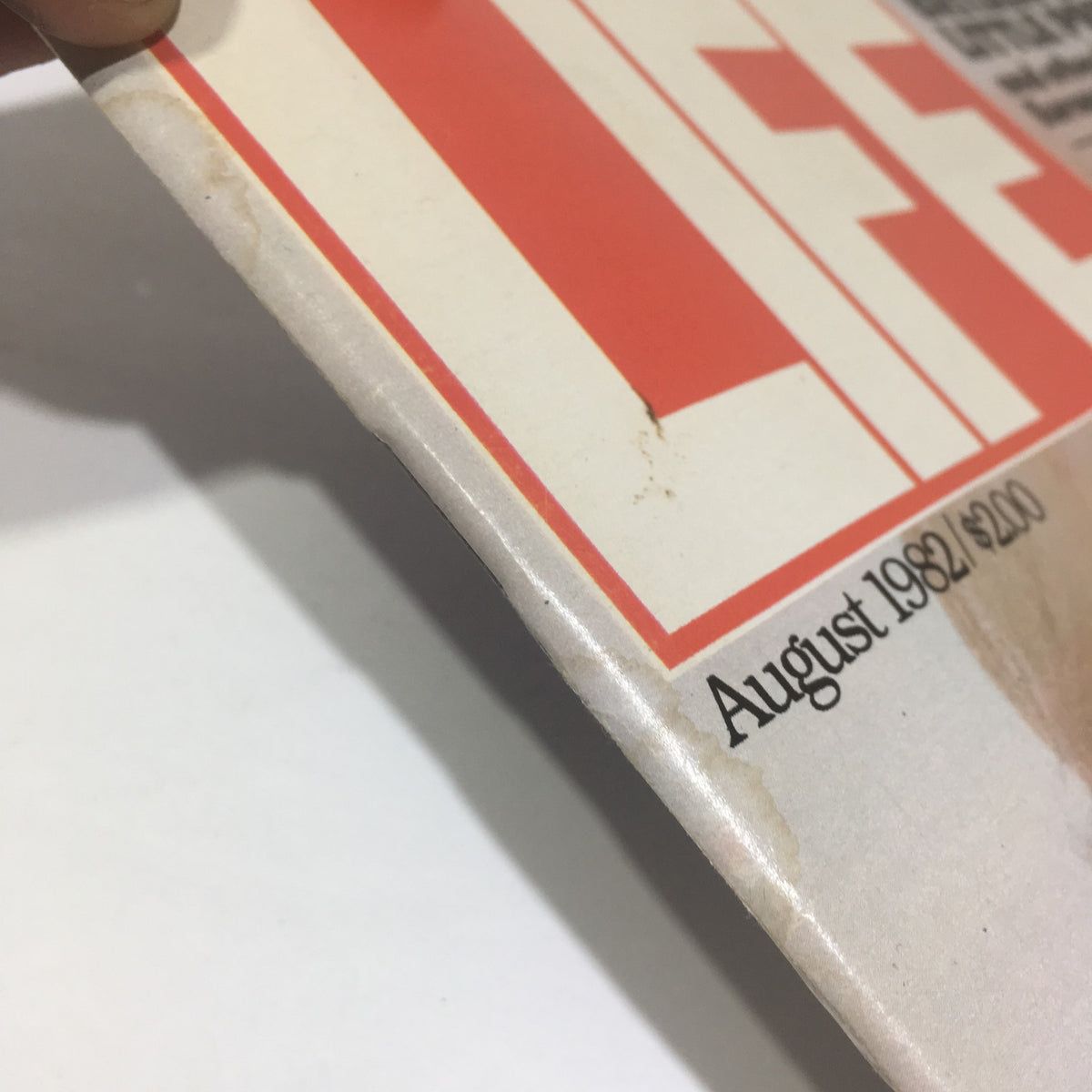 Side detail of Life Magazine: The Unseen Marilyn August 1982 illustrating wear and age with the publication date clearly visible.