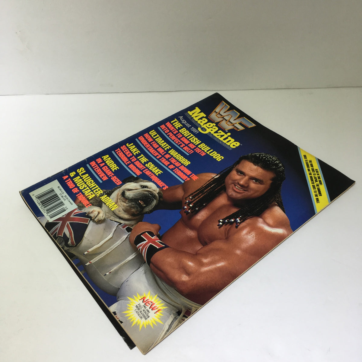 Side view of WWF Magazine: The British Bulldog August 1991, illustrating the magazine's spine along with cover art featuring The British Bulldog and a bulldog.