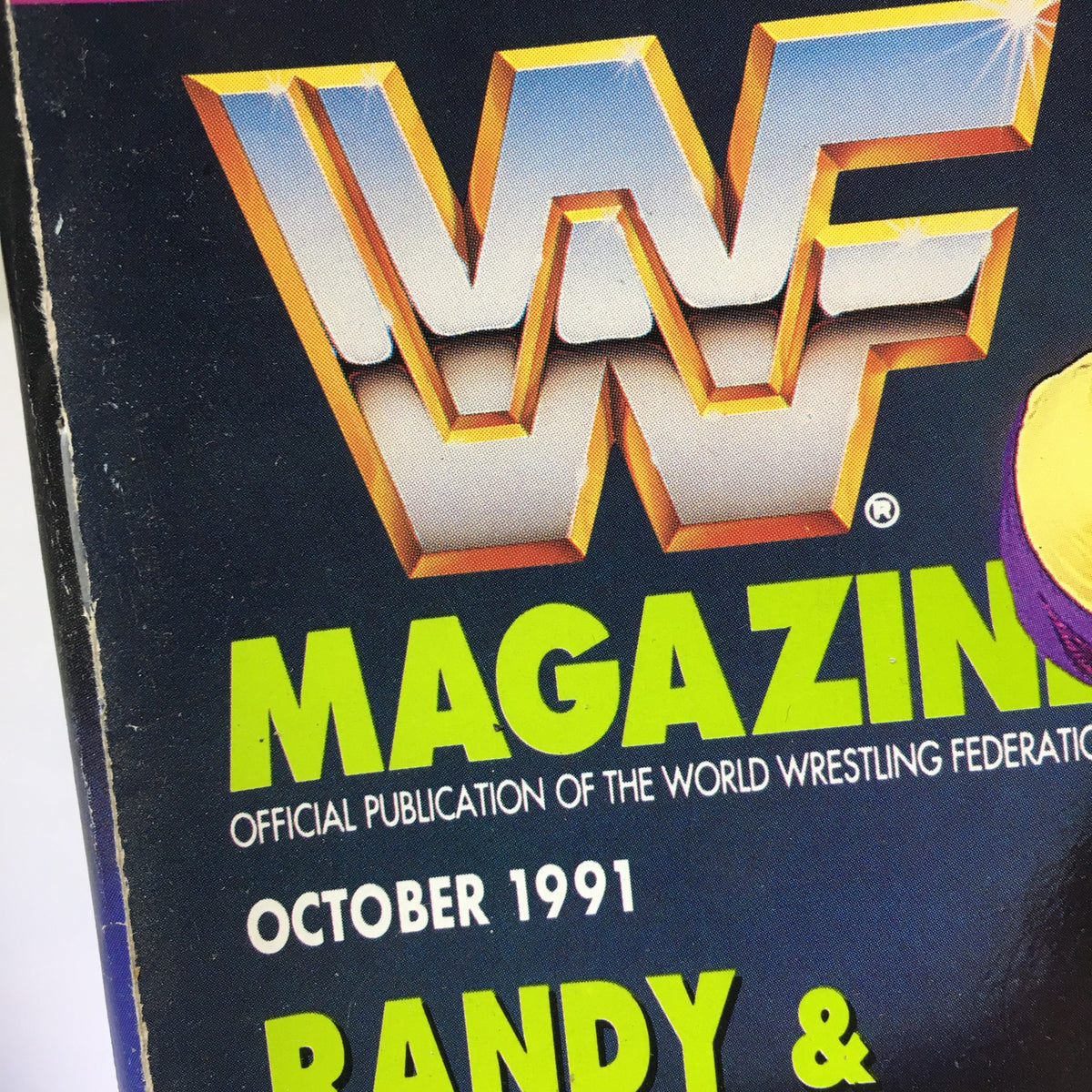 Close-up of the WWF Magazine logo and title, October 1991, which prominently features Randy and Elizabeth, capturing the essence of wrestling's golden era.