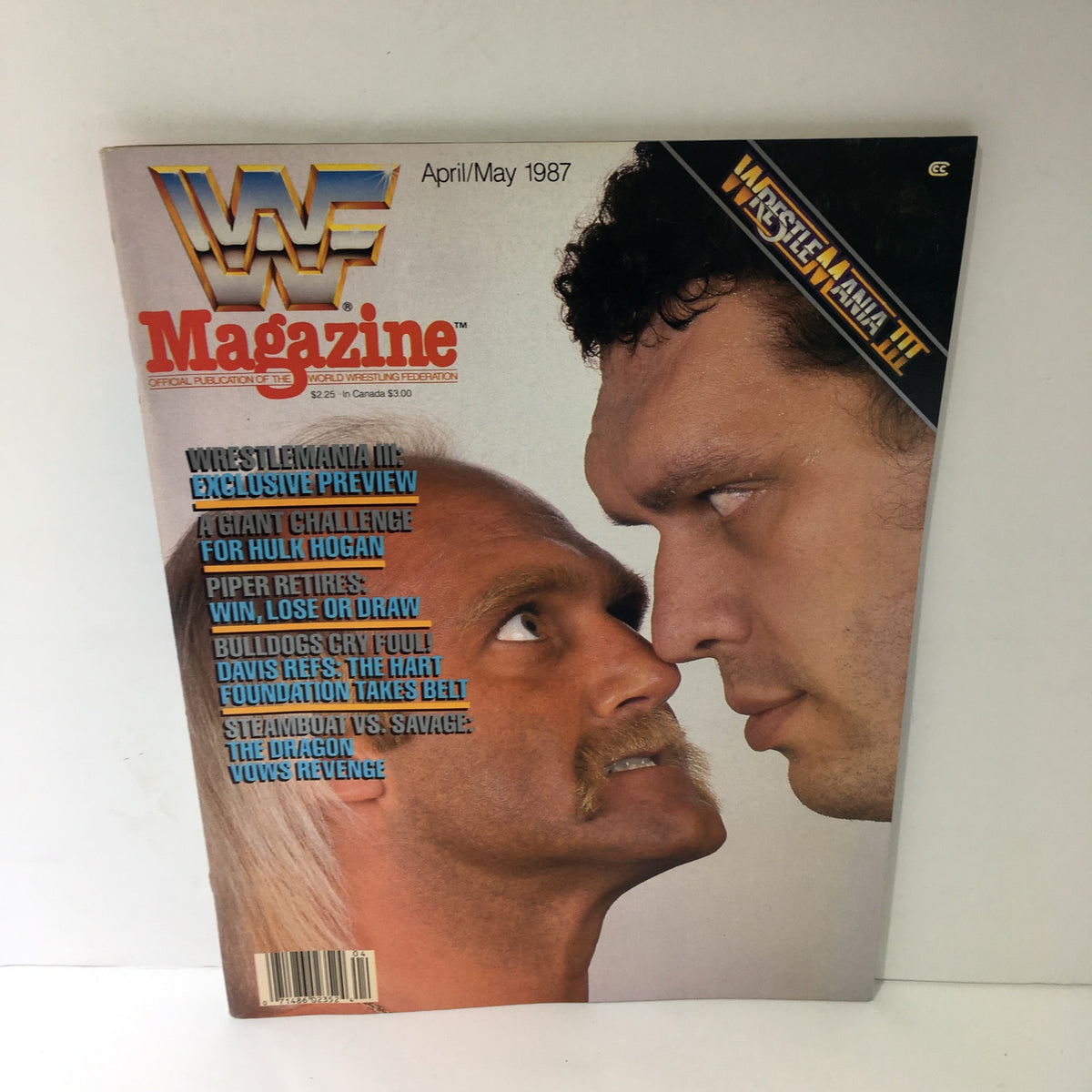 Cover of WWF Magazine, April/May 1987, featuring Hulk Hogan and Andre the Giant with a detailed preview of Wrestle Mania III and articles related to wrestling legends.