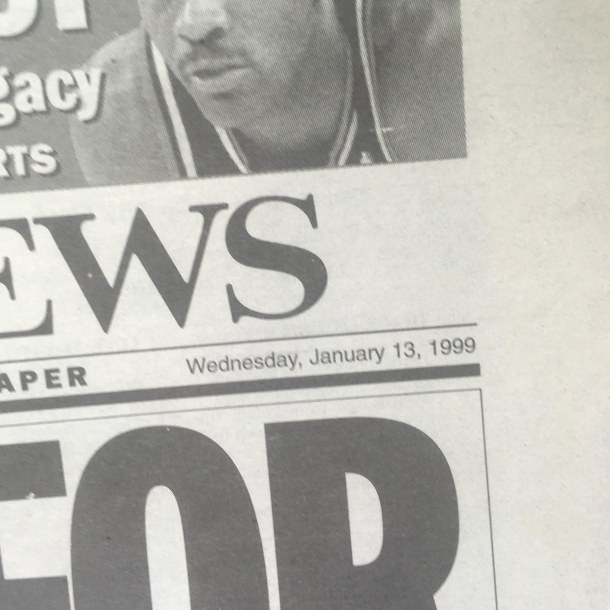 Close-up of the NY Daily News dated January 13, 1999, showcasing the headline 'SOLD FOR $2.7M' related to McGwire's record home run ball.