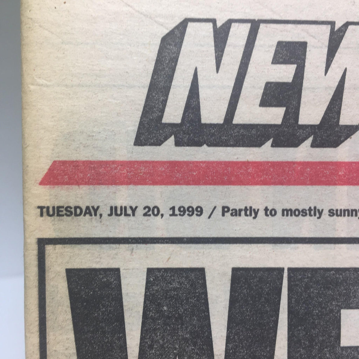 Close-up of the date on the NY Post from July 20, 1999, indicating a Tuesday publication.