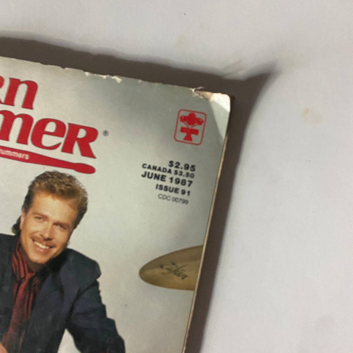 Close-up of the Modern Drummer Magazine June 1987 cover featuring J.R. Robinson, emphasizing the magazine's iconic design and details about notable drummers including Lars Ulrich.