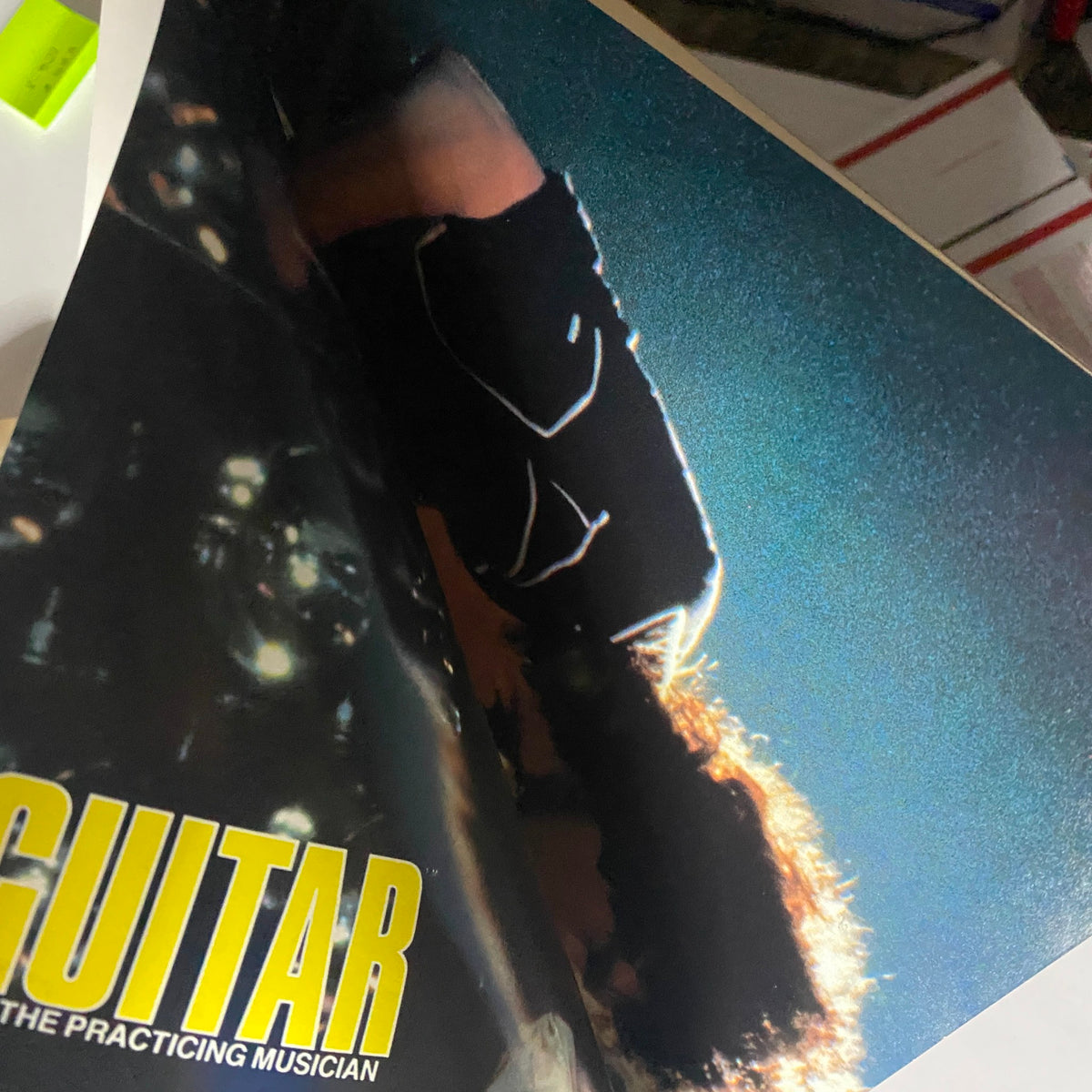Pullout poster from the Vintage Guitar Magazine October 1984, showcasing a vibrant image of a musician, enhancing the collectible nature of the magazine.