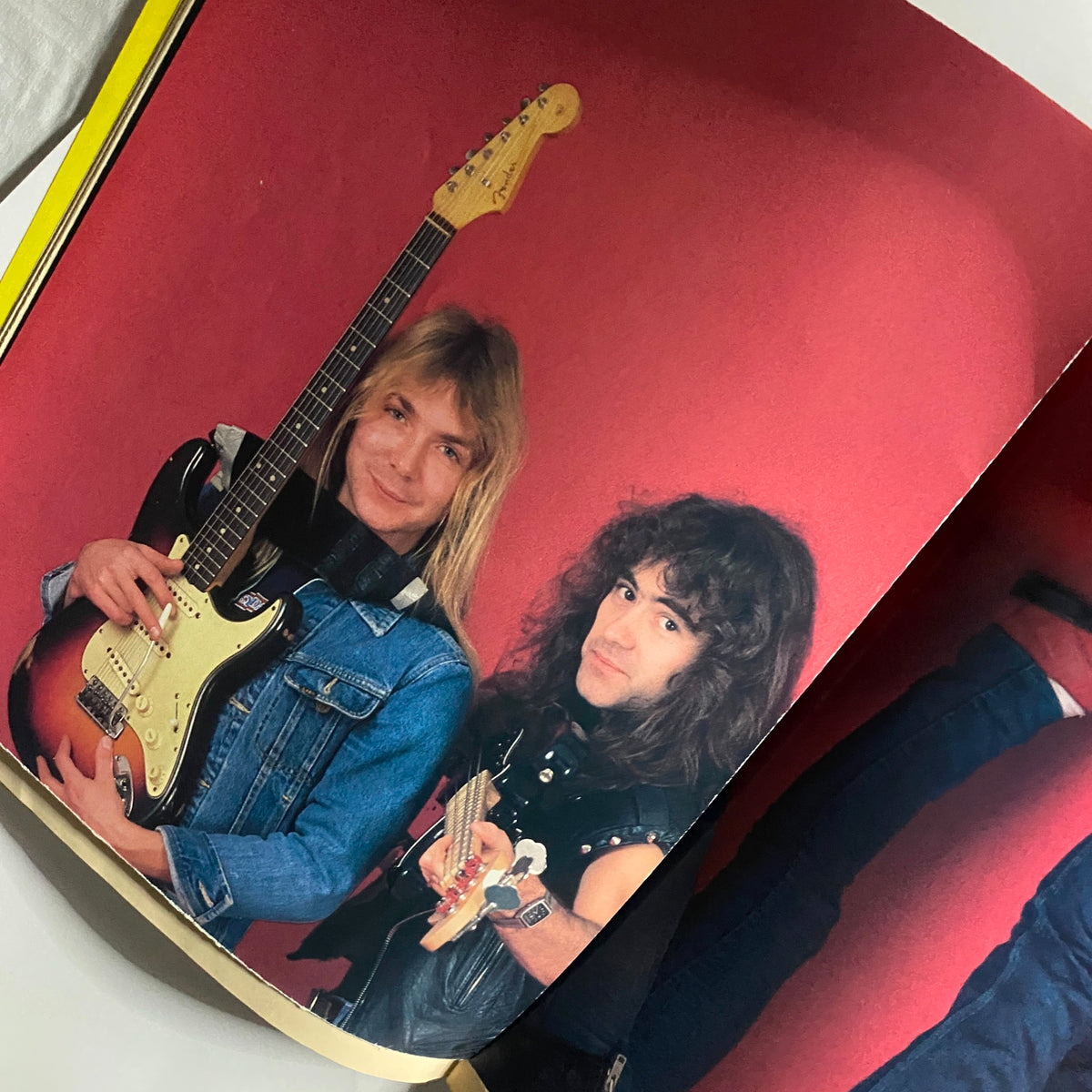 Guitar Magazine March 1986 featuring guitarists Yngwie Malmsteen and Billy Sheehan, showcasing their iconic styles with electric guitars in vintage photography.