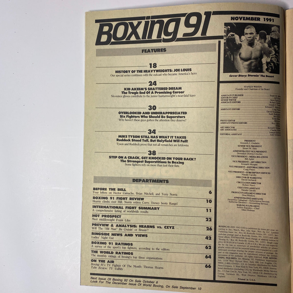 Interior page of Boxing 91 Magazine November 1991 outlining features including a tribute to Joe Louis and articles on boxing tragedies and superstitions, part of the magazine's in-depth examination of heavyweight boxing.